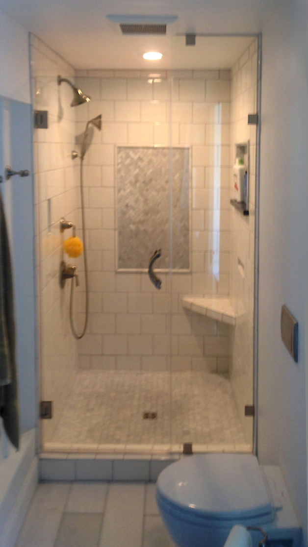 This shower is glowing in light - we made a custom door with heavy glass and custom clips in Madison, WI