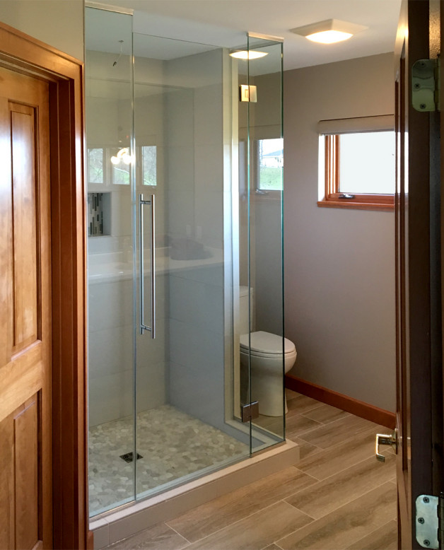 Custom enclosure w/ all glass corner. Oregon Wis.