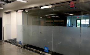 Interior folding glass wall