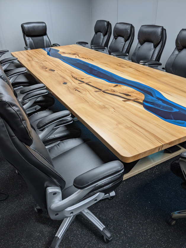 wood conference desk with blue glass 